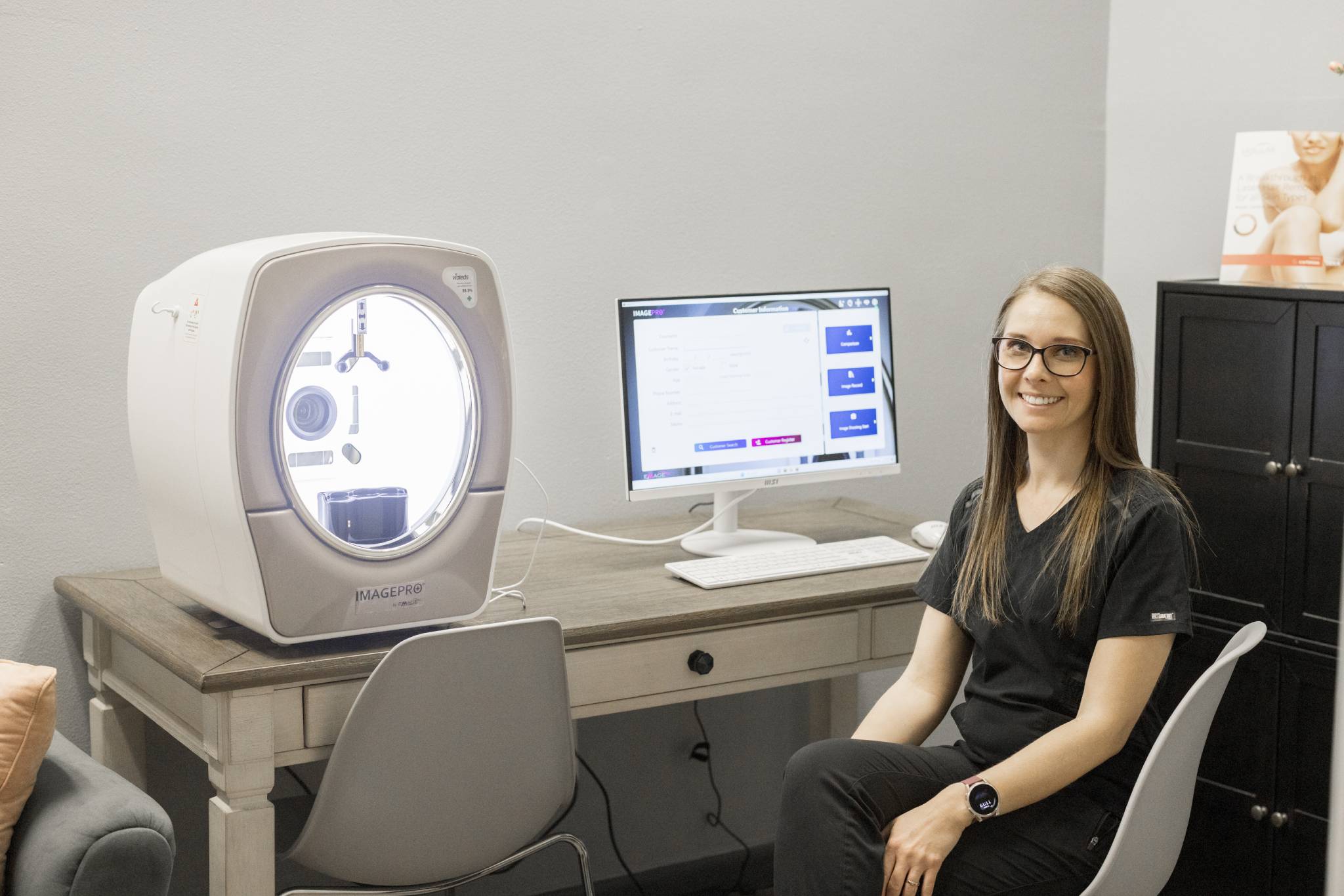 a person standing in front of a computer